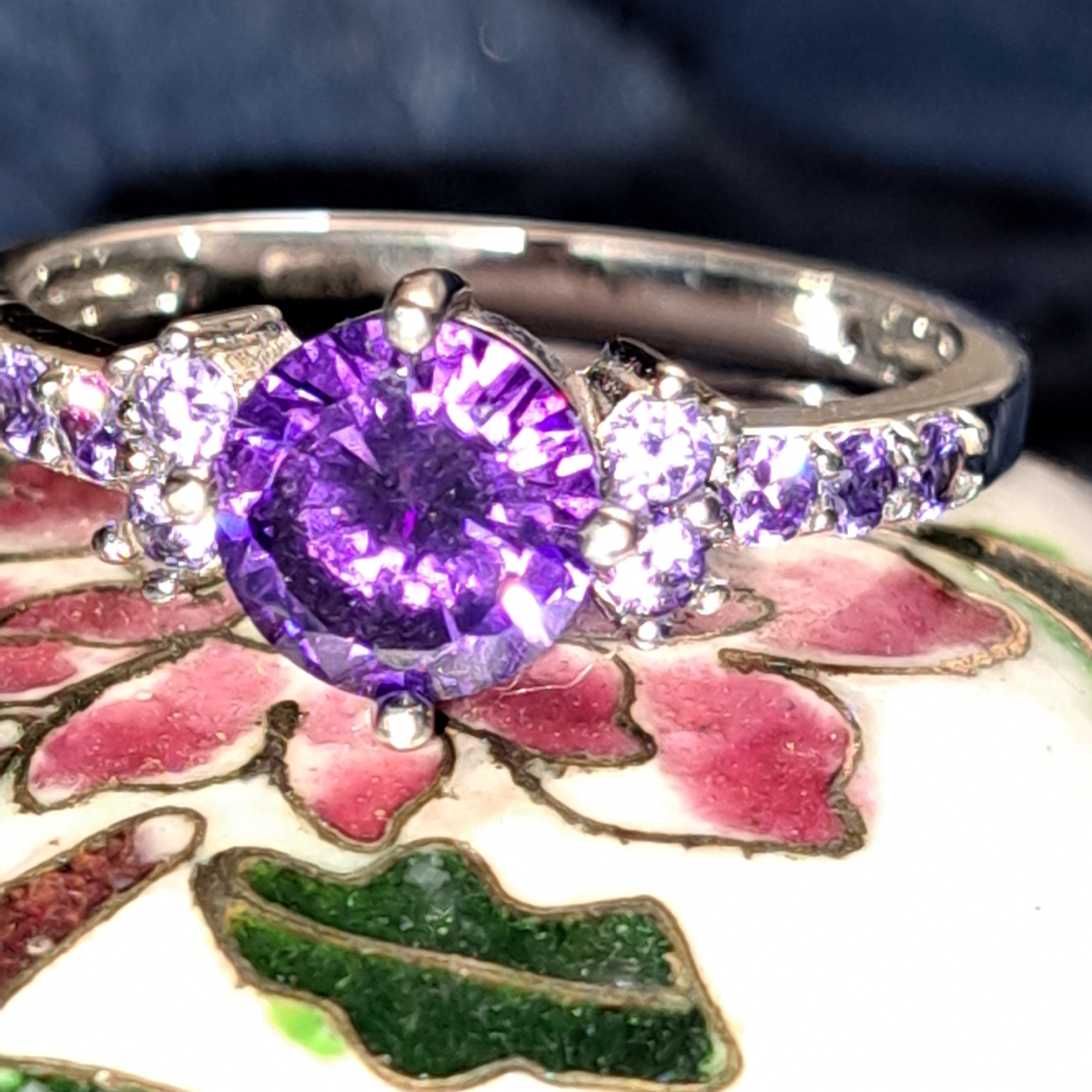 Dazzling Silver Ring With Purple Gemstones 45$